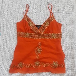 Bebe barely worn orange top with golden embroidery
